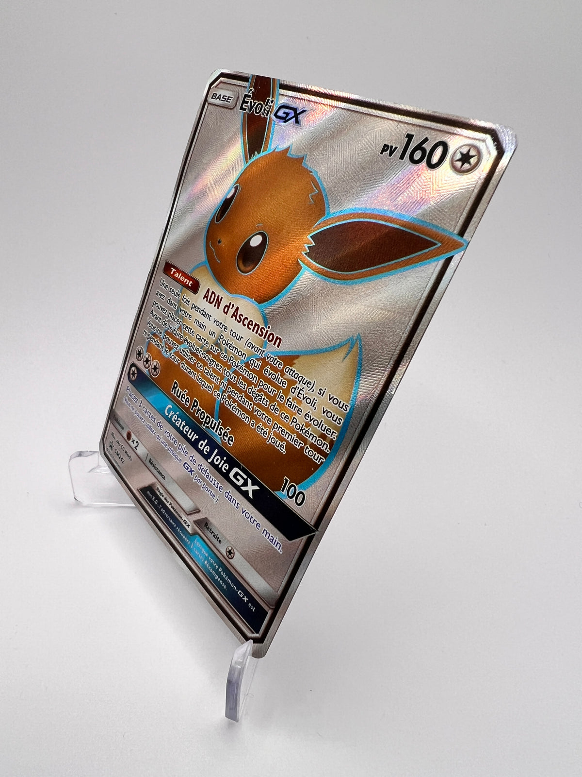 Evoli GX SM242 - Promos Black Star Soleil Lune