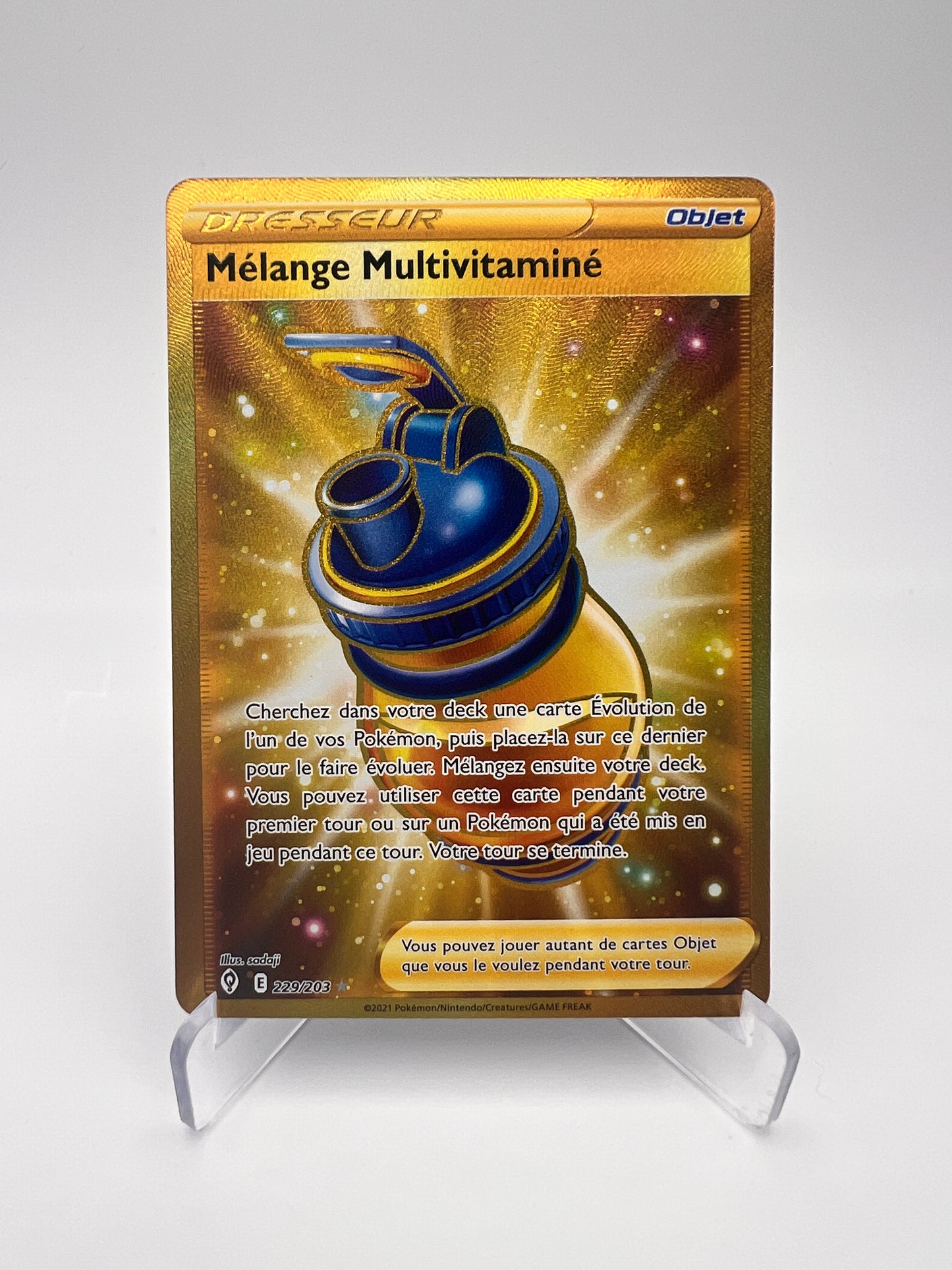 Mélange Multivitaminé 229/203 – Évolution Céleste – FR – Gold Secret Rare – Near Mint